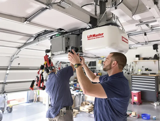 Manchester Garage Door Repair technician performing advanced diagnostics on garage opener in Manchester
